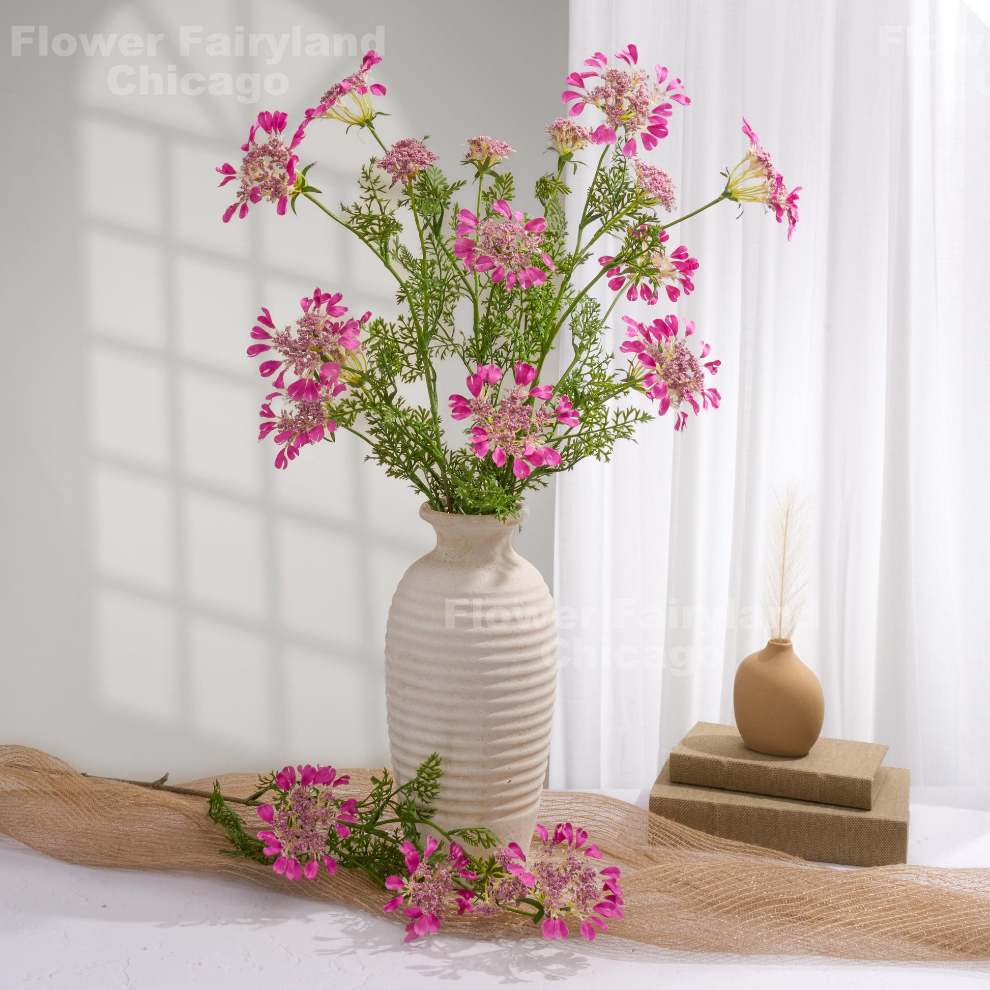 Fuchsia lace flowers styled in vase