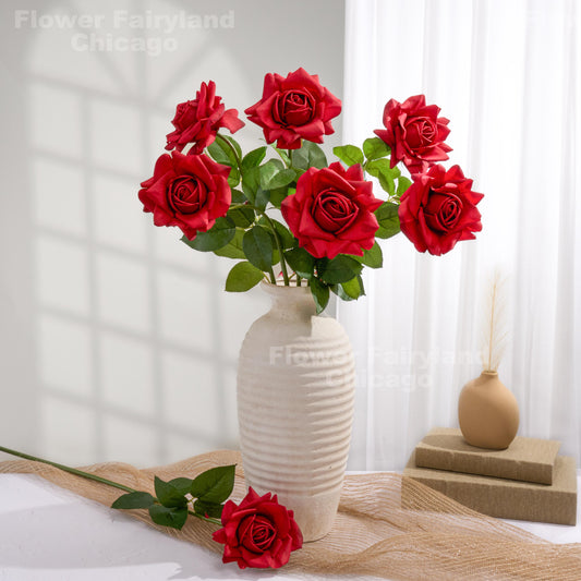 Red roses styled in a home decor scene