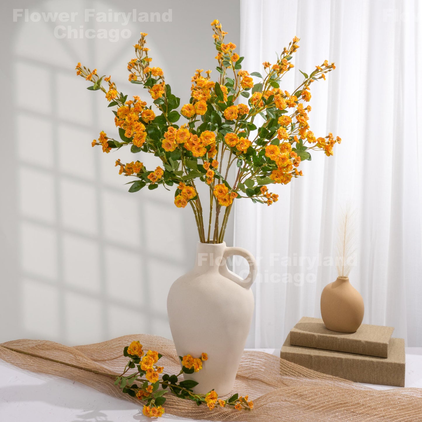 Yellowish orange miniature roses arrangement