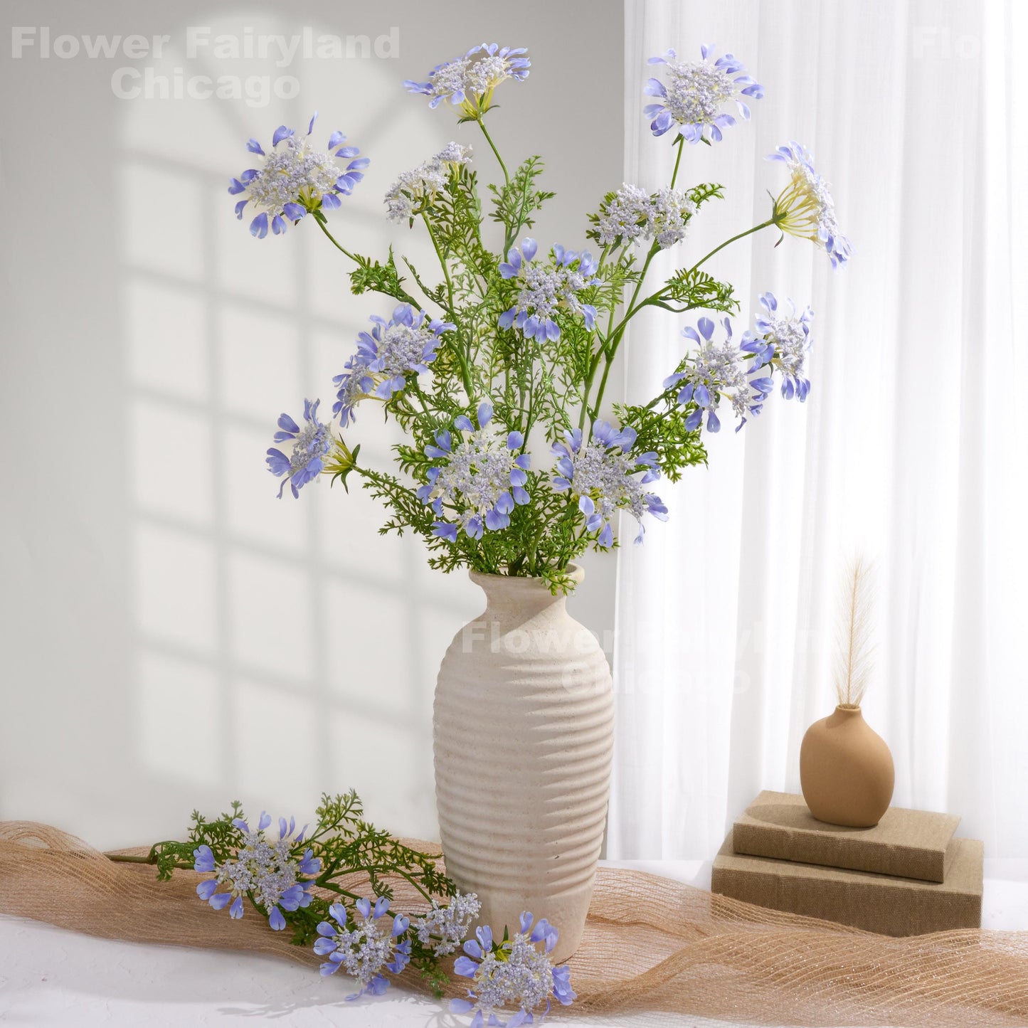 Sky blue lace flowers styled in vase