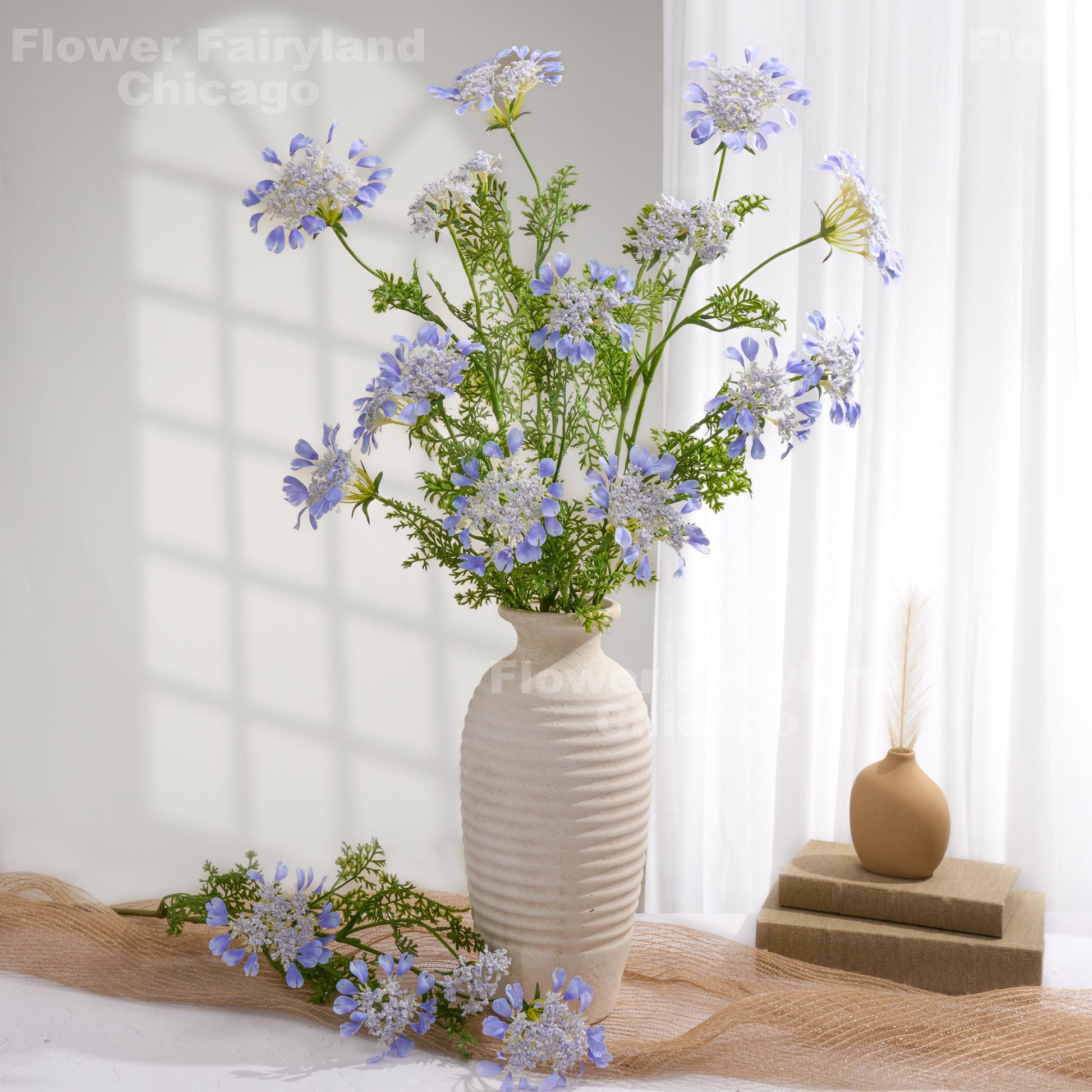 Sky blue lace flowers styled in vase