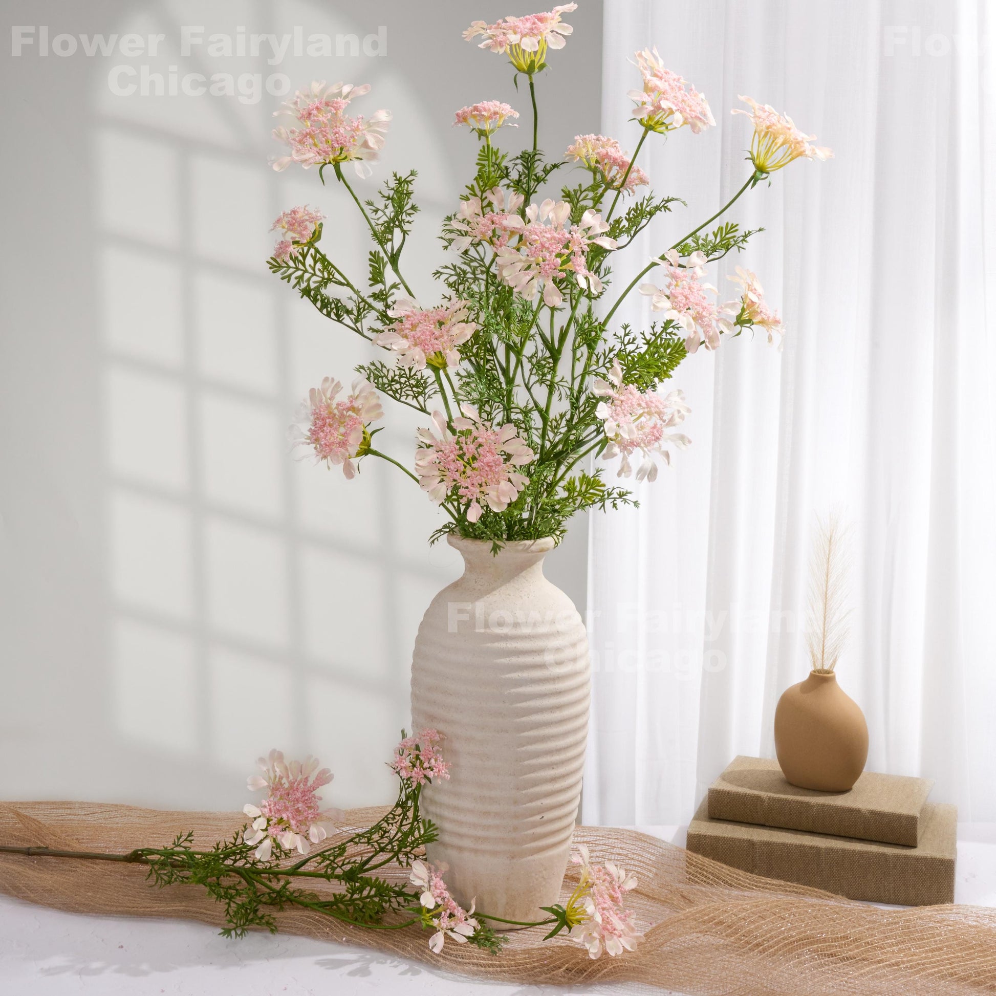 Light pink lace flowers styled in vase
