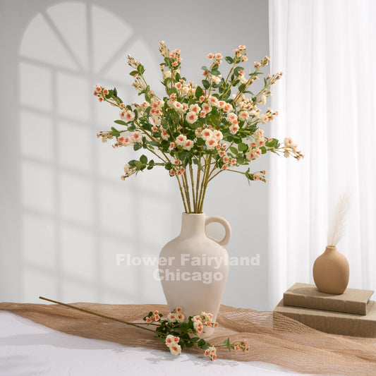 Peach miniature roses arrangement