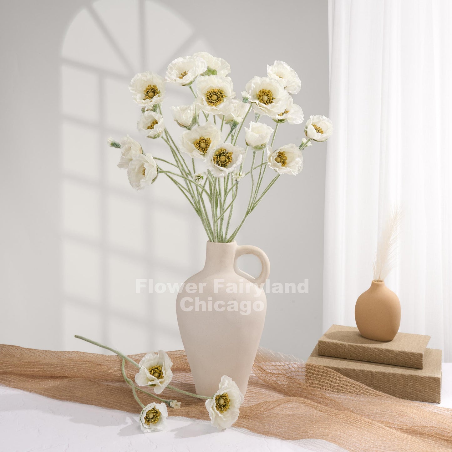 White Iceland poppies styled in a vase