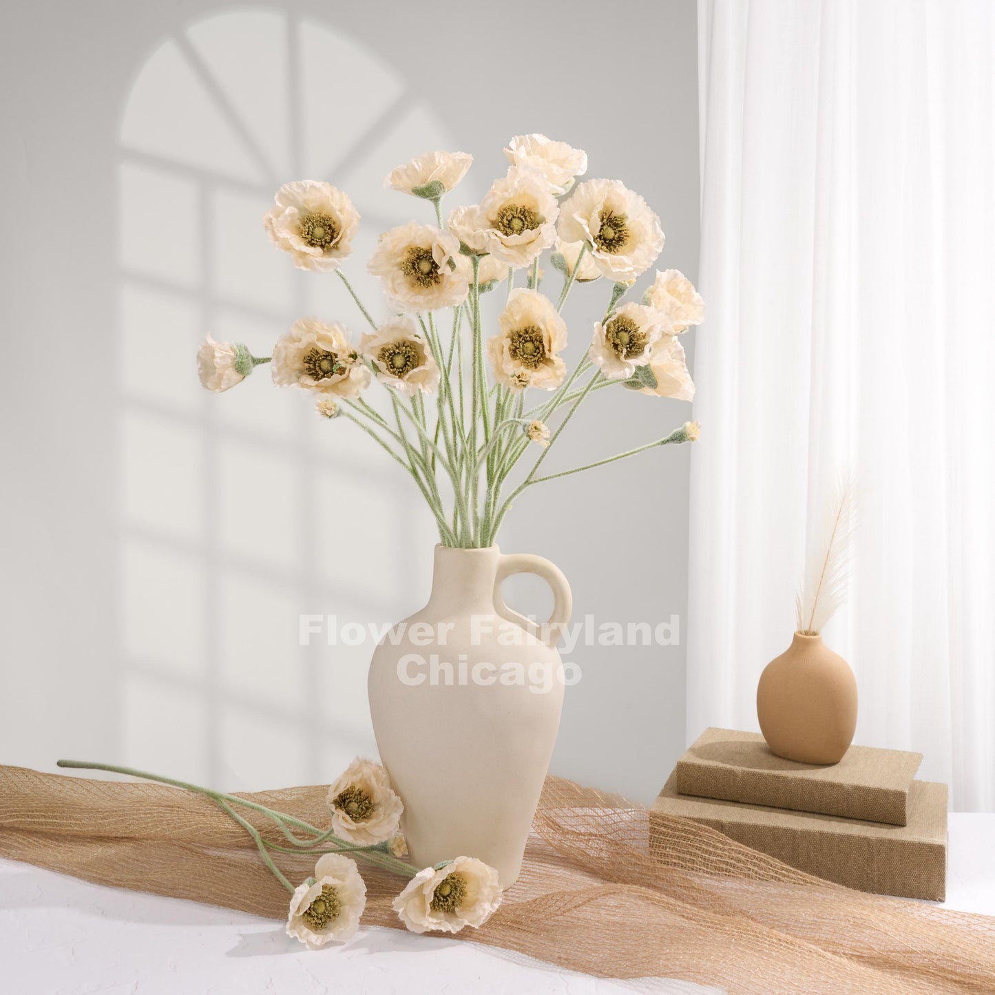 Light champagne Iceland poppies styled in a vase
