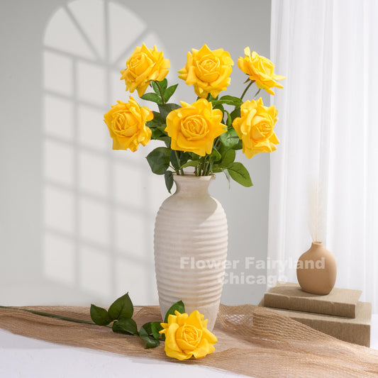 Yellow roses styled in a home decor scene
