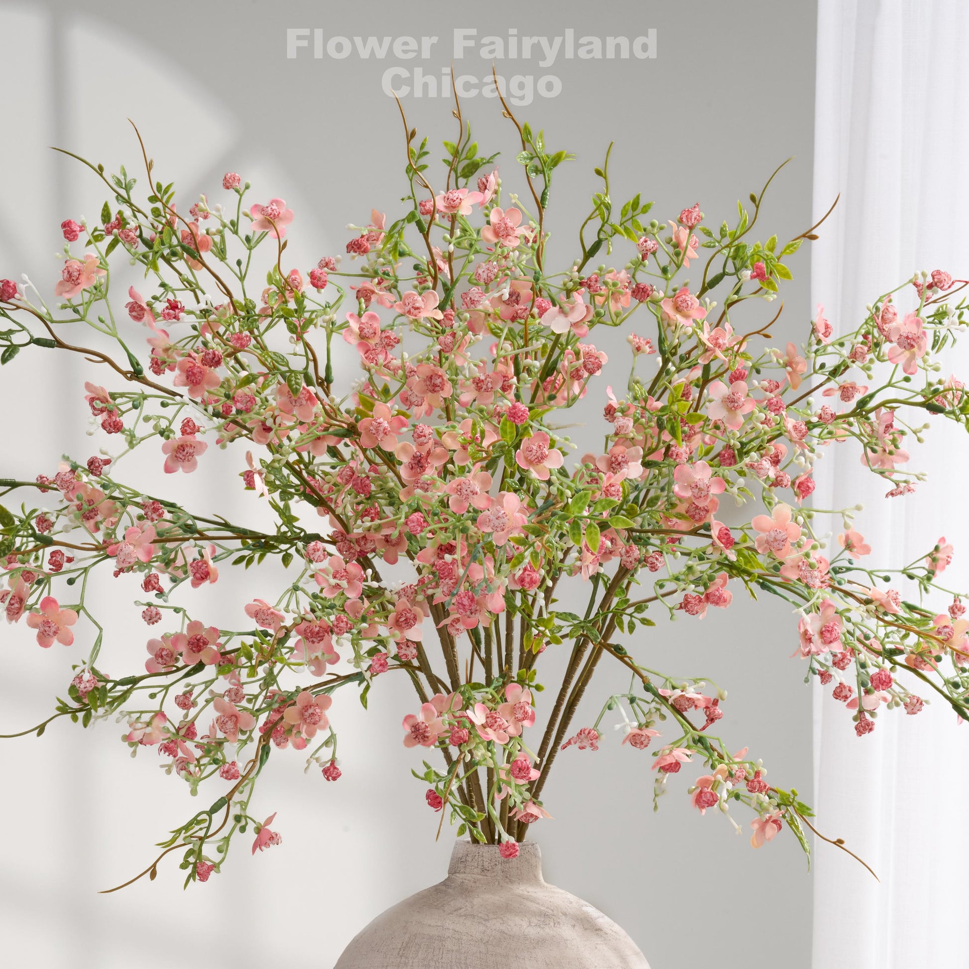 Faux wax flower stem in pink