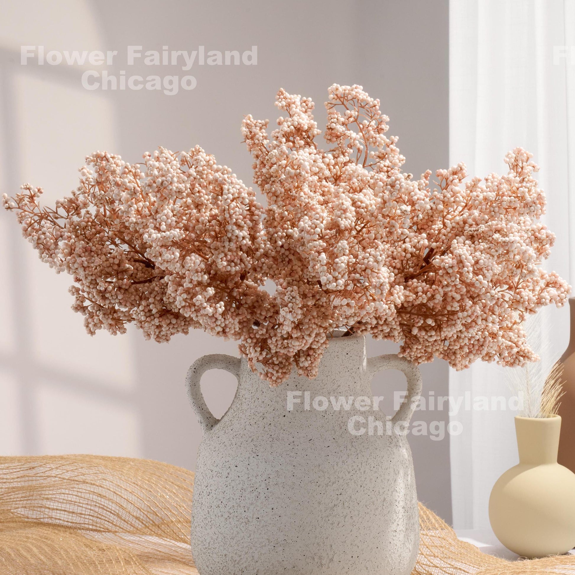 Pale pink faux mini berries stem