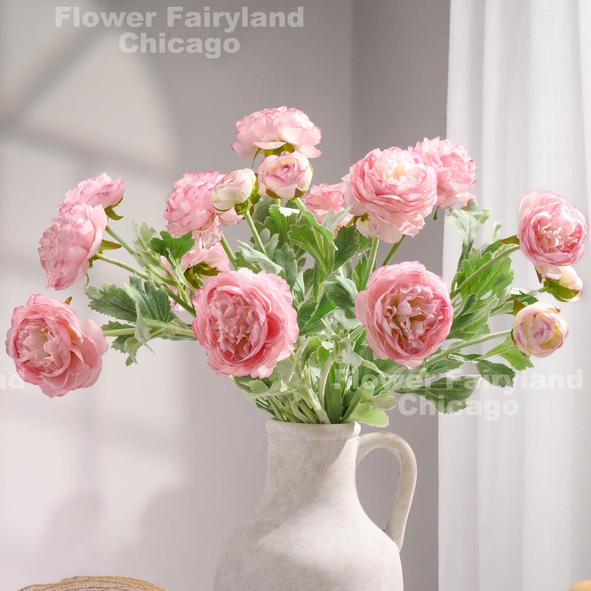 Pink 3 head faux ranunculus stems in vase