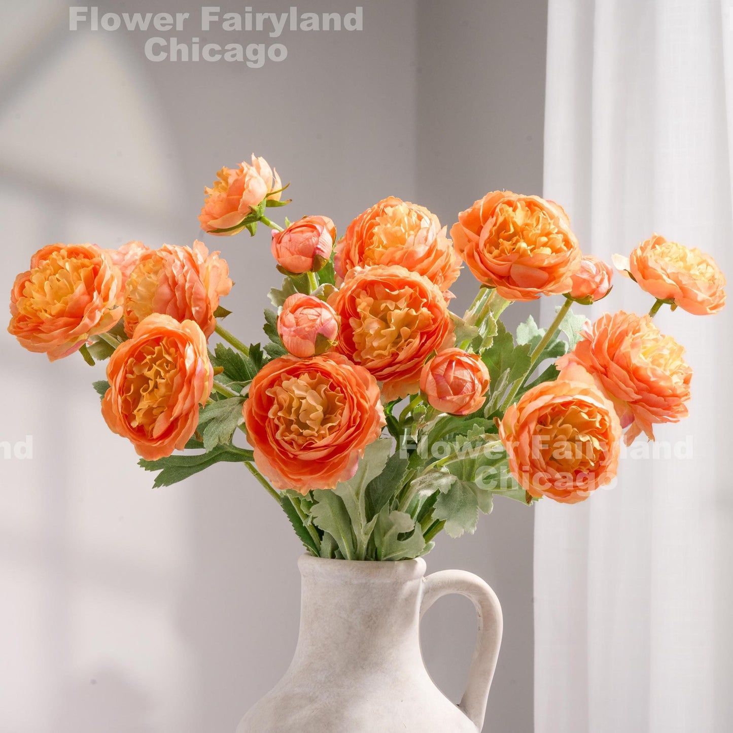 Gradient orange 3 head faux ranunculus stems in vase