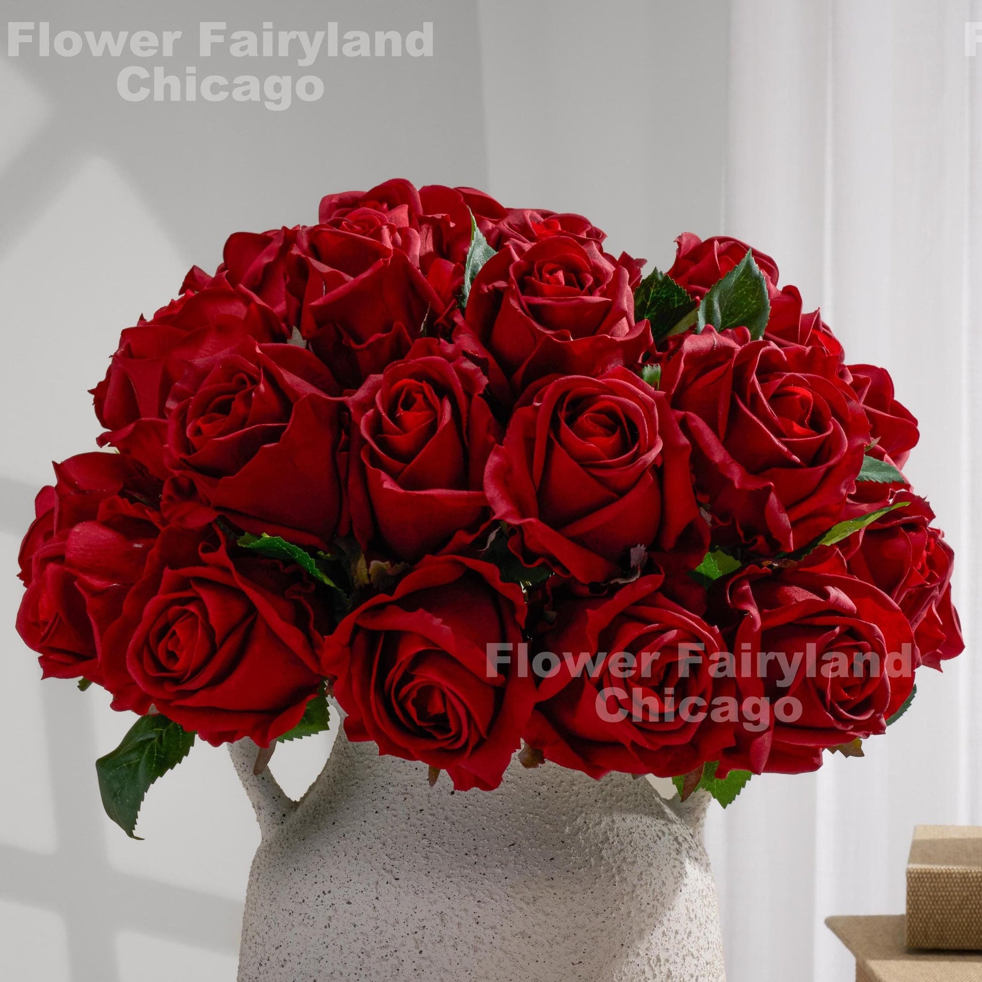 Red rose bouquet styled in vase