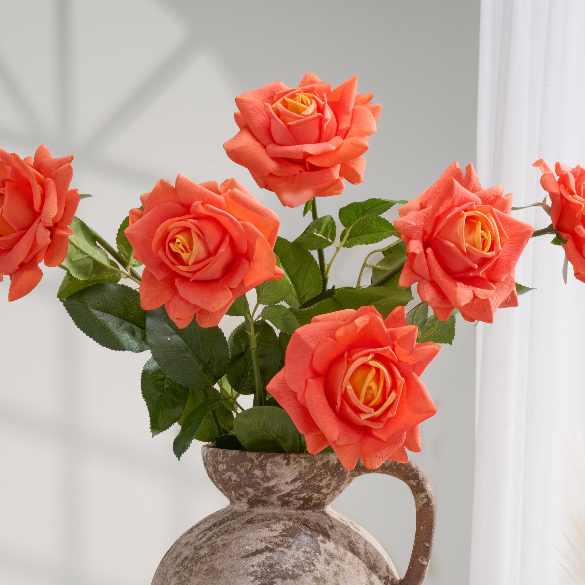 Orange ombre real touch full bloom roses in a vase