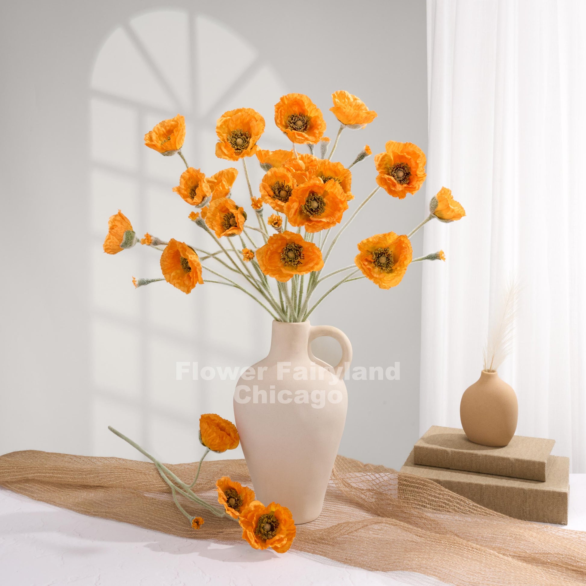 Orange Iceland poppies styled in a vase
