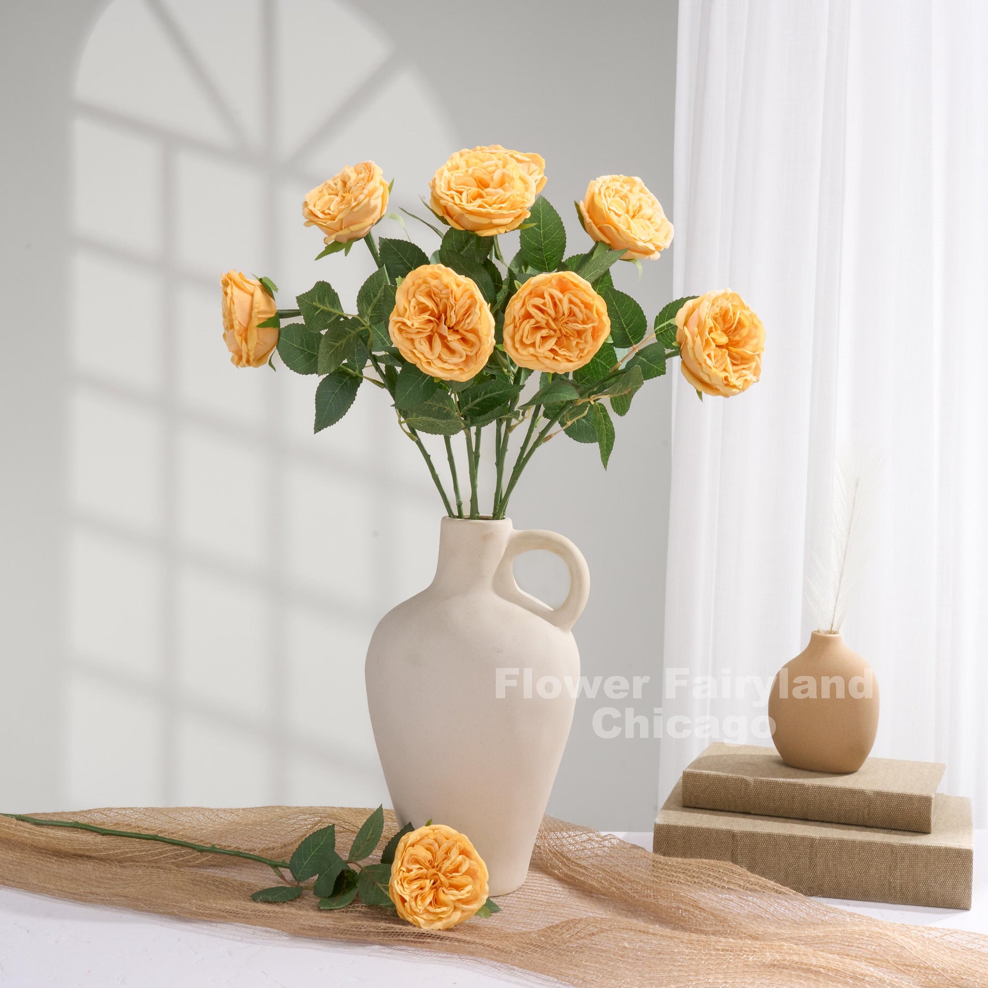 Yellowish orange English rose arrangement