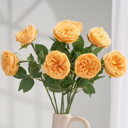 Yellowish orange real touch David Austin rose stems in vase