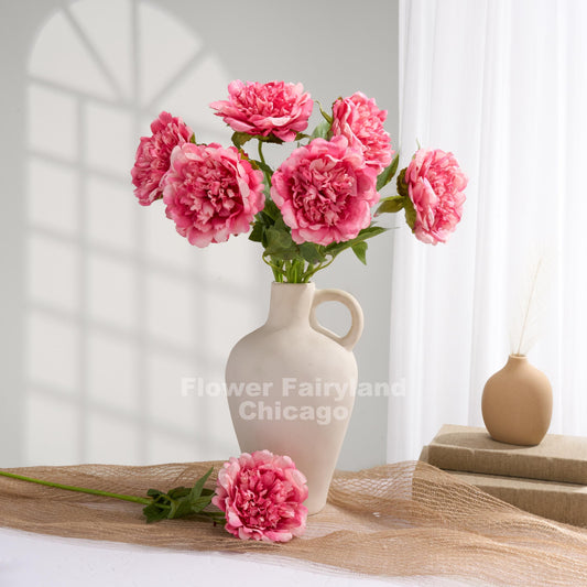 Raspberry splash faux peonies styled in a vase