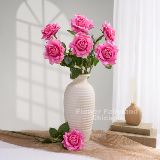 Pretty pink roses styled in a vase