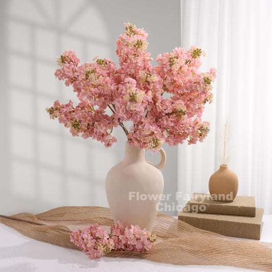 Light pink lilac arrangement in vase