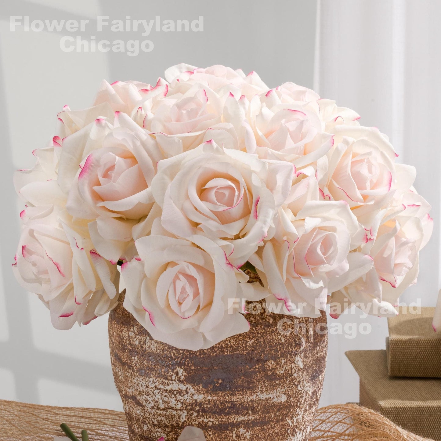 Pink edge real touch rose bouquet in a vase
