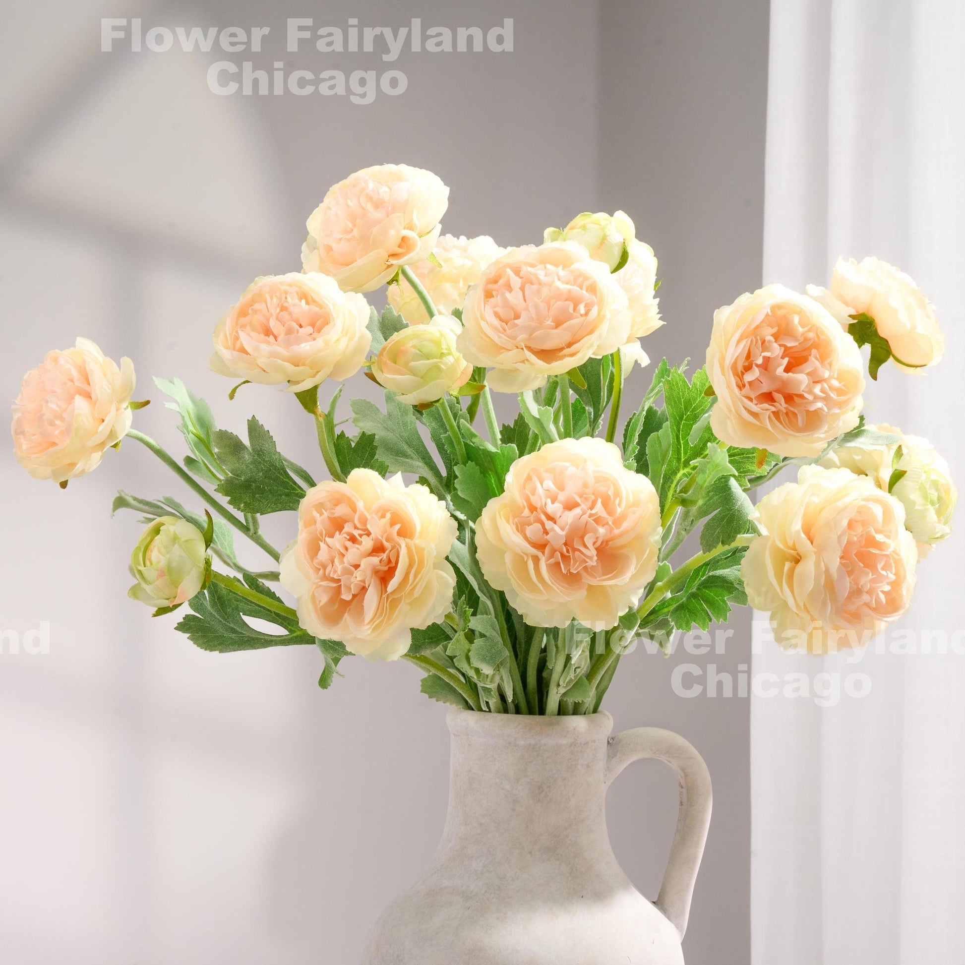 Gradient peach 3 head faux ranunculus stems in vase