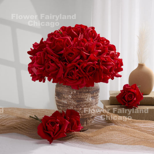 Red moist latex roses in vase
