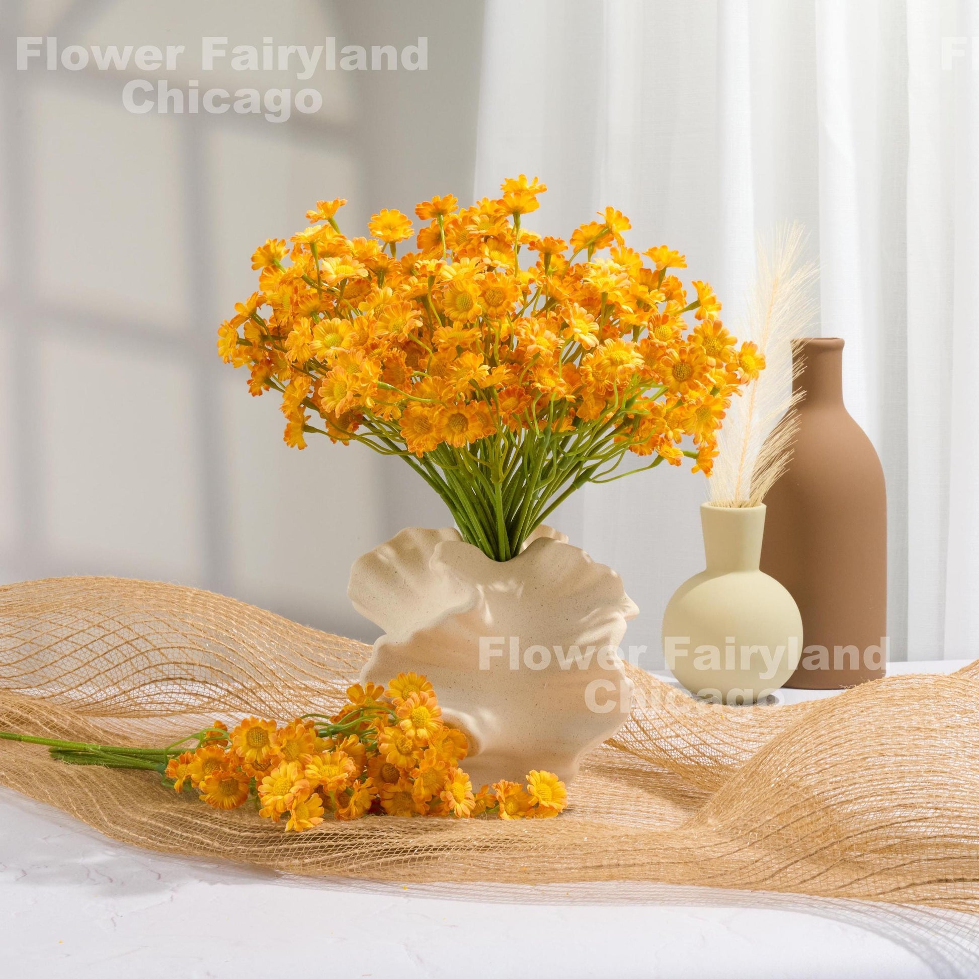 Orange chamomile styled in vase