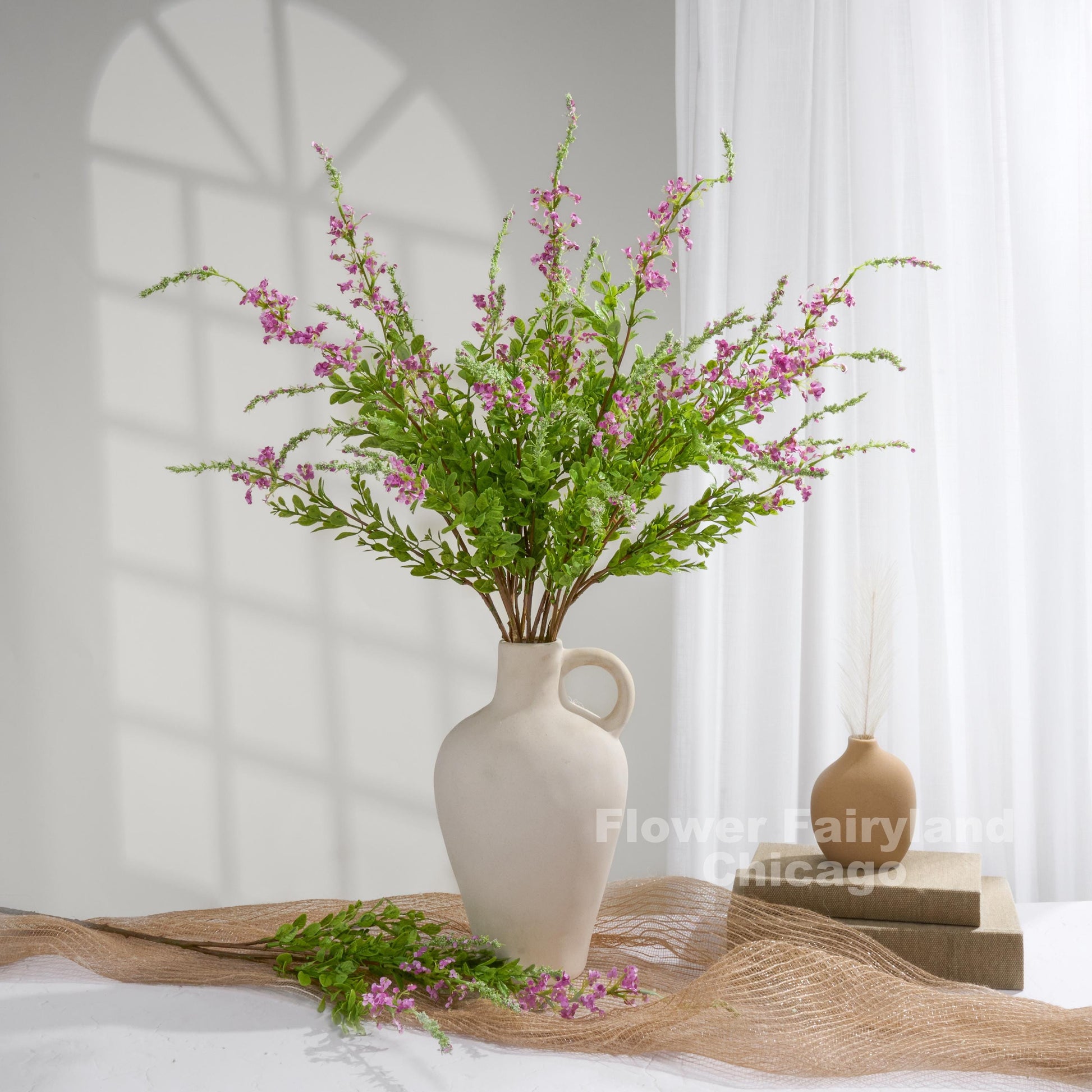 Purple sage branches styled in vase