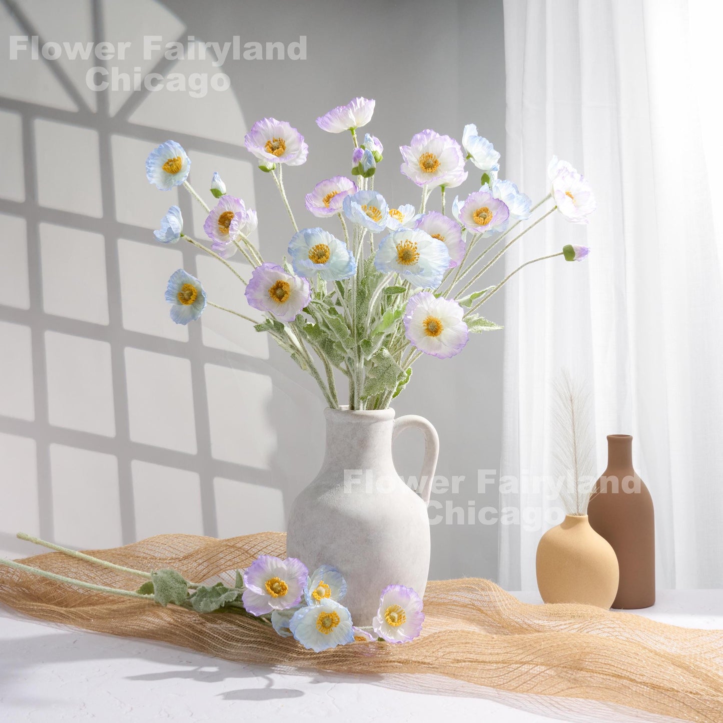 Lavender edge poppy arrangement