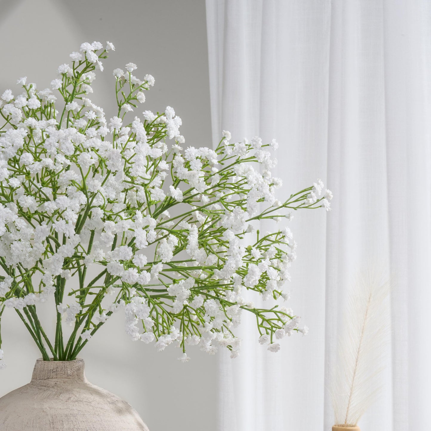Faux baby's breath stem in white