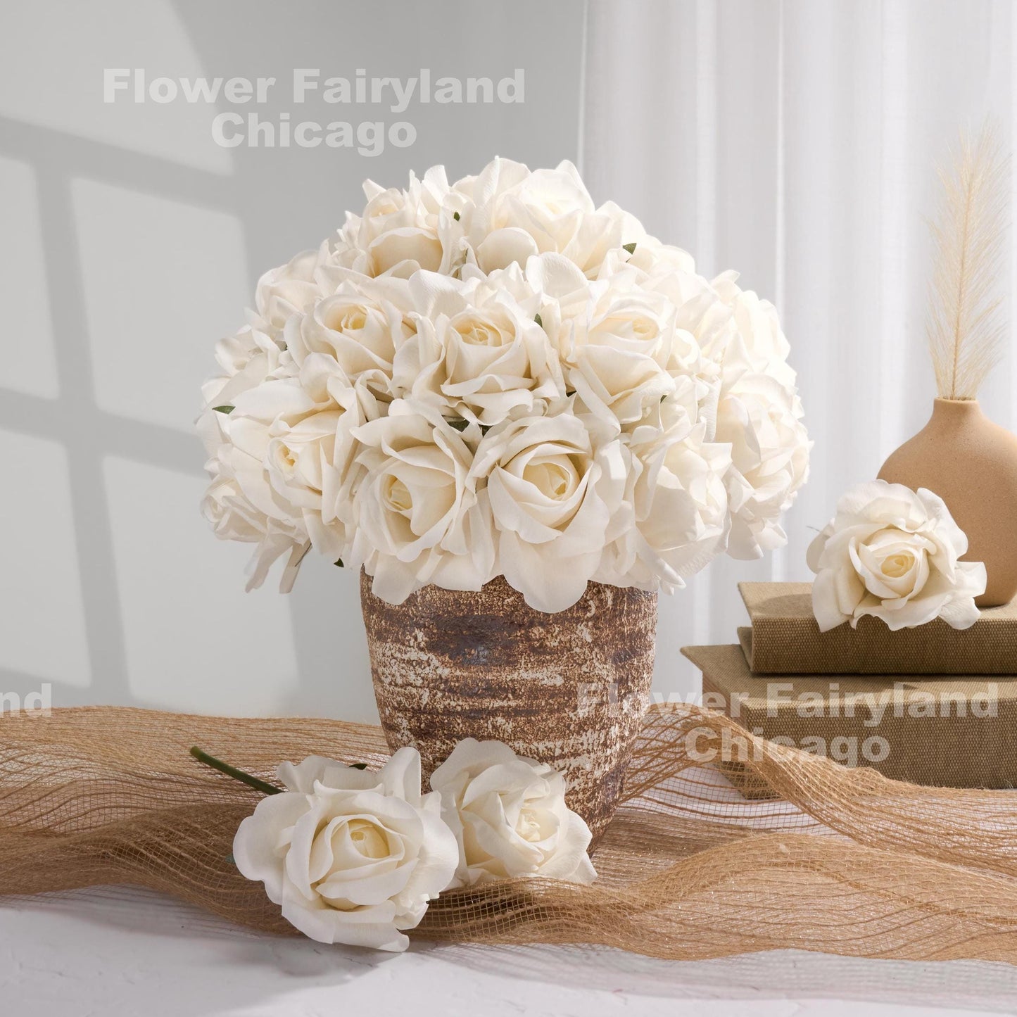 Milky white roses styled in vase