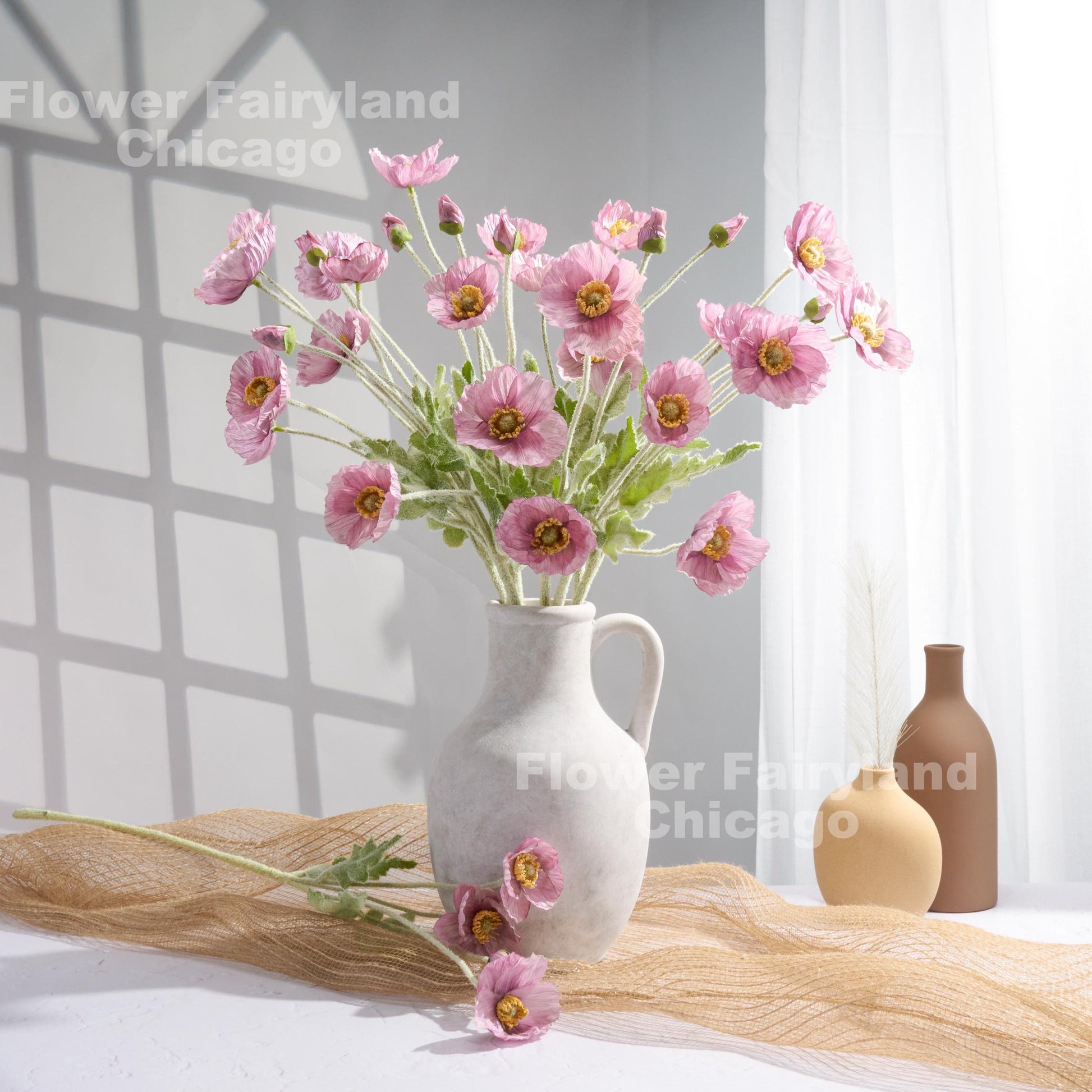 Lilac mauve poppies styled scene