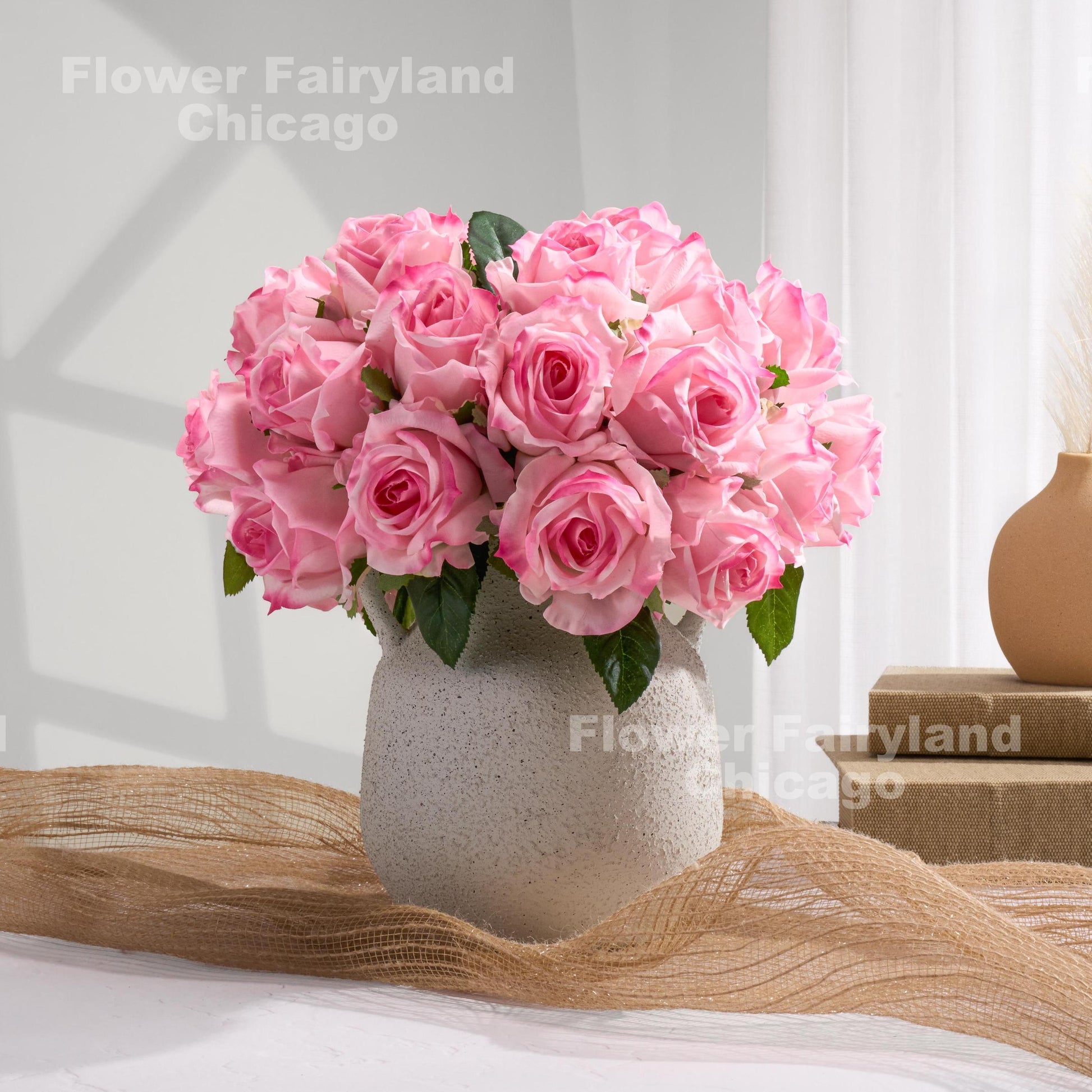 Pink roses styled in vase