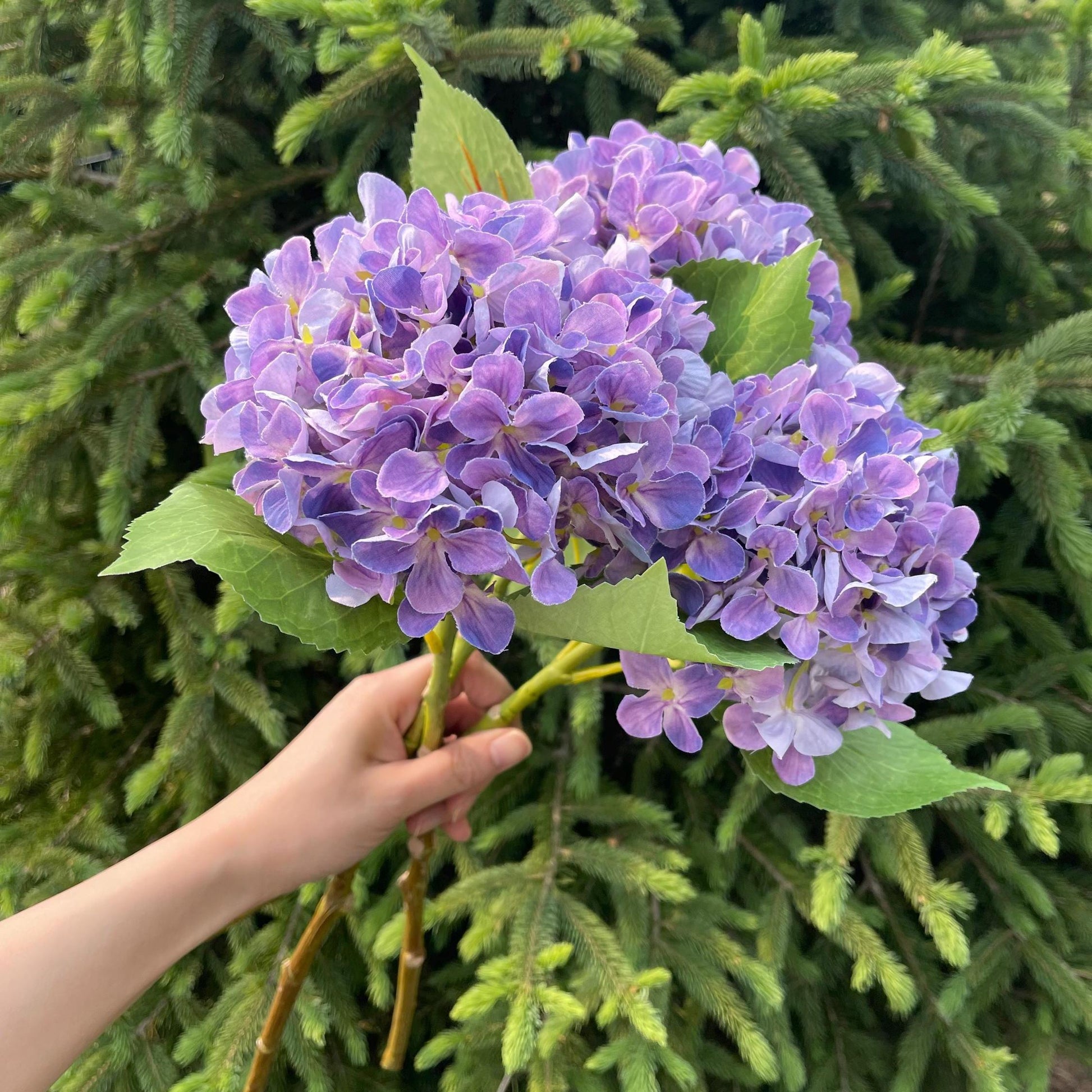 Purple faux hydrangea full stem view