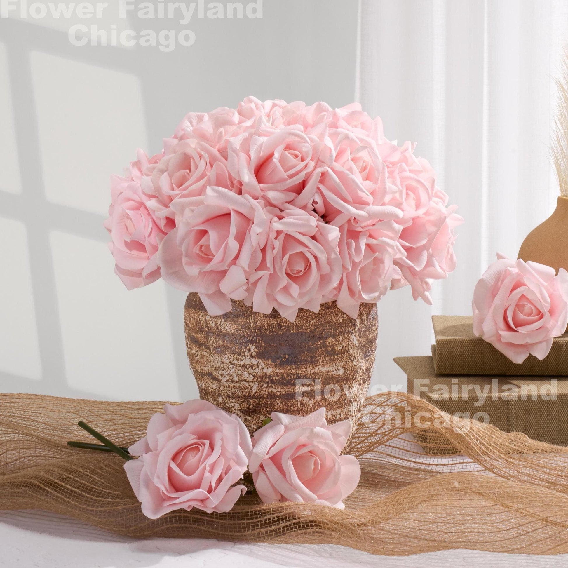 Light pink real touch rose bouquet styled in a vase