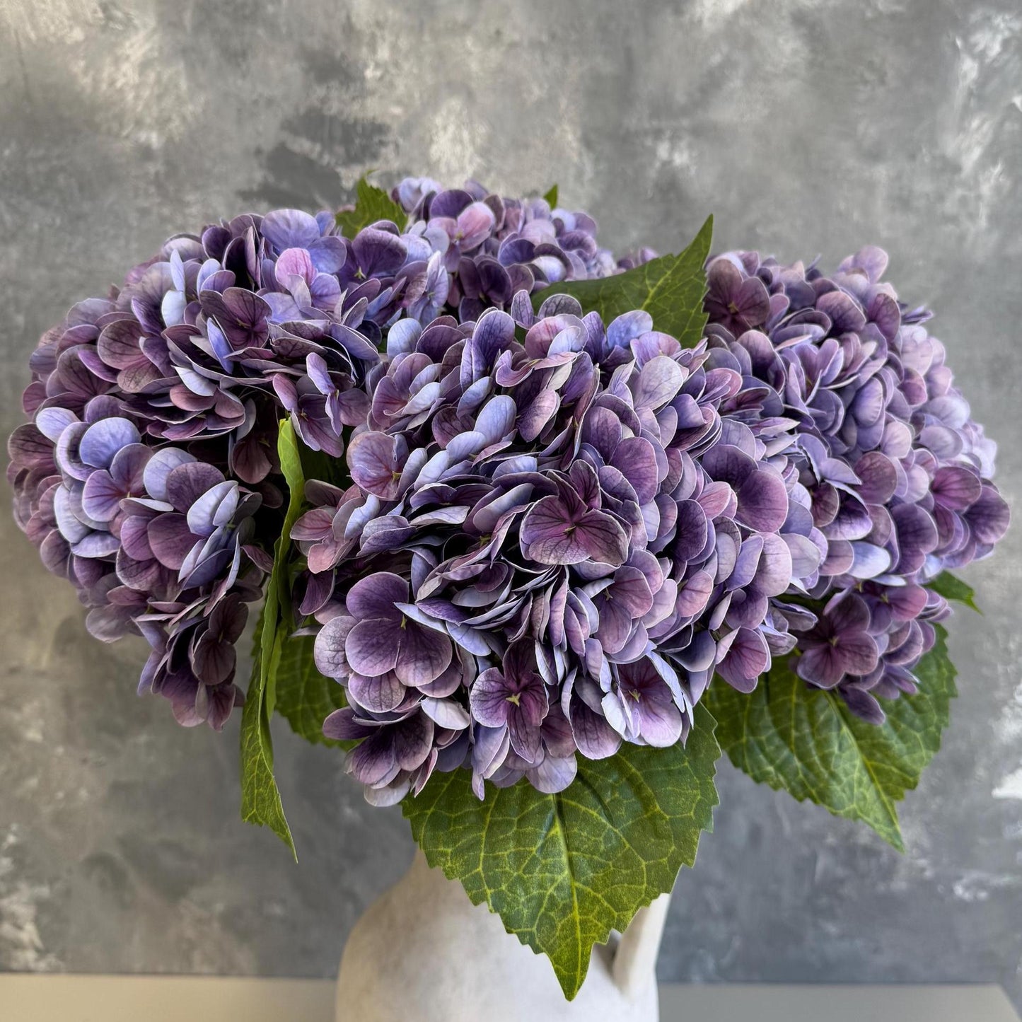 Gradient grape purple hydrangea in arrangement