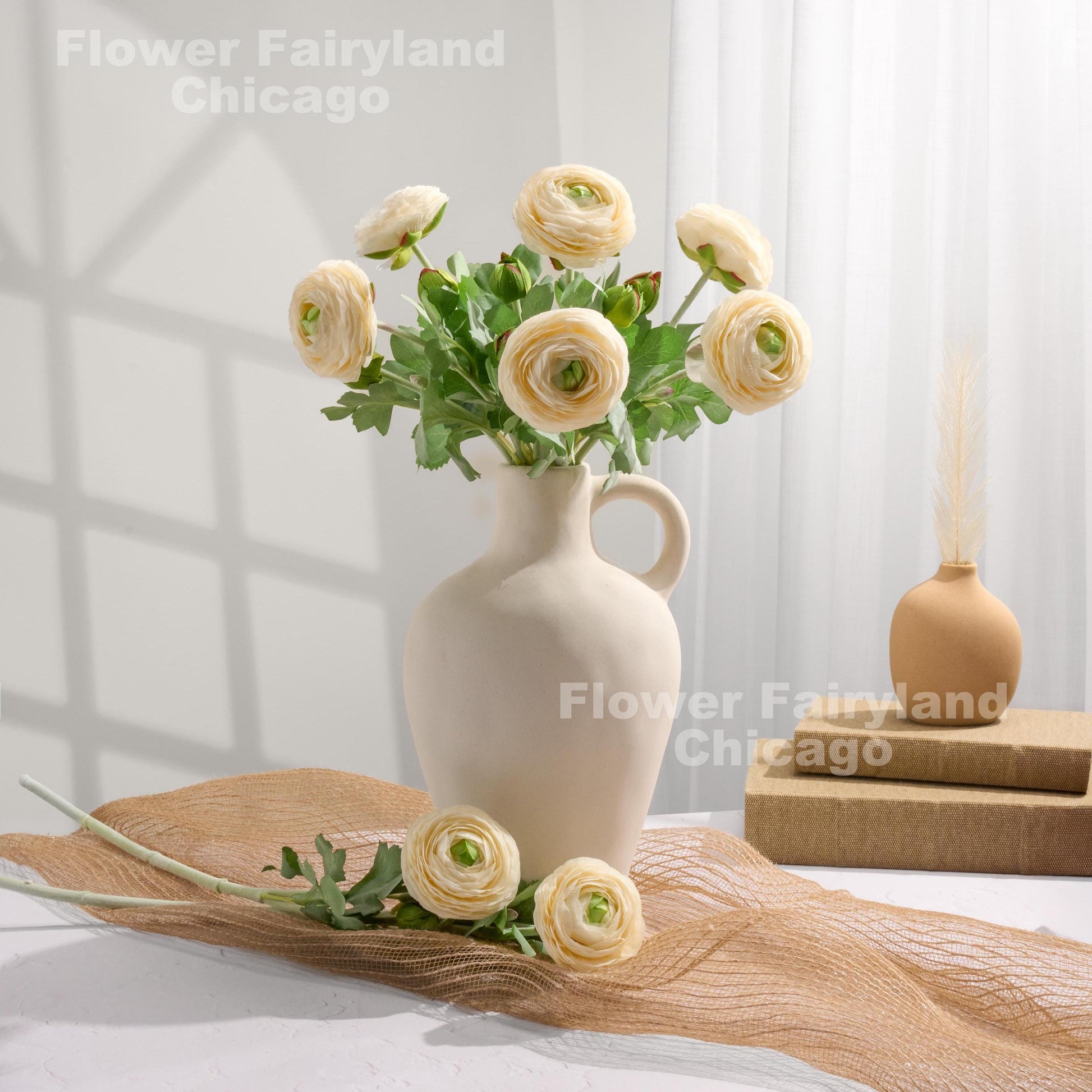 Milky white ranunculus arrangement