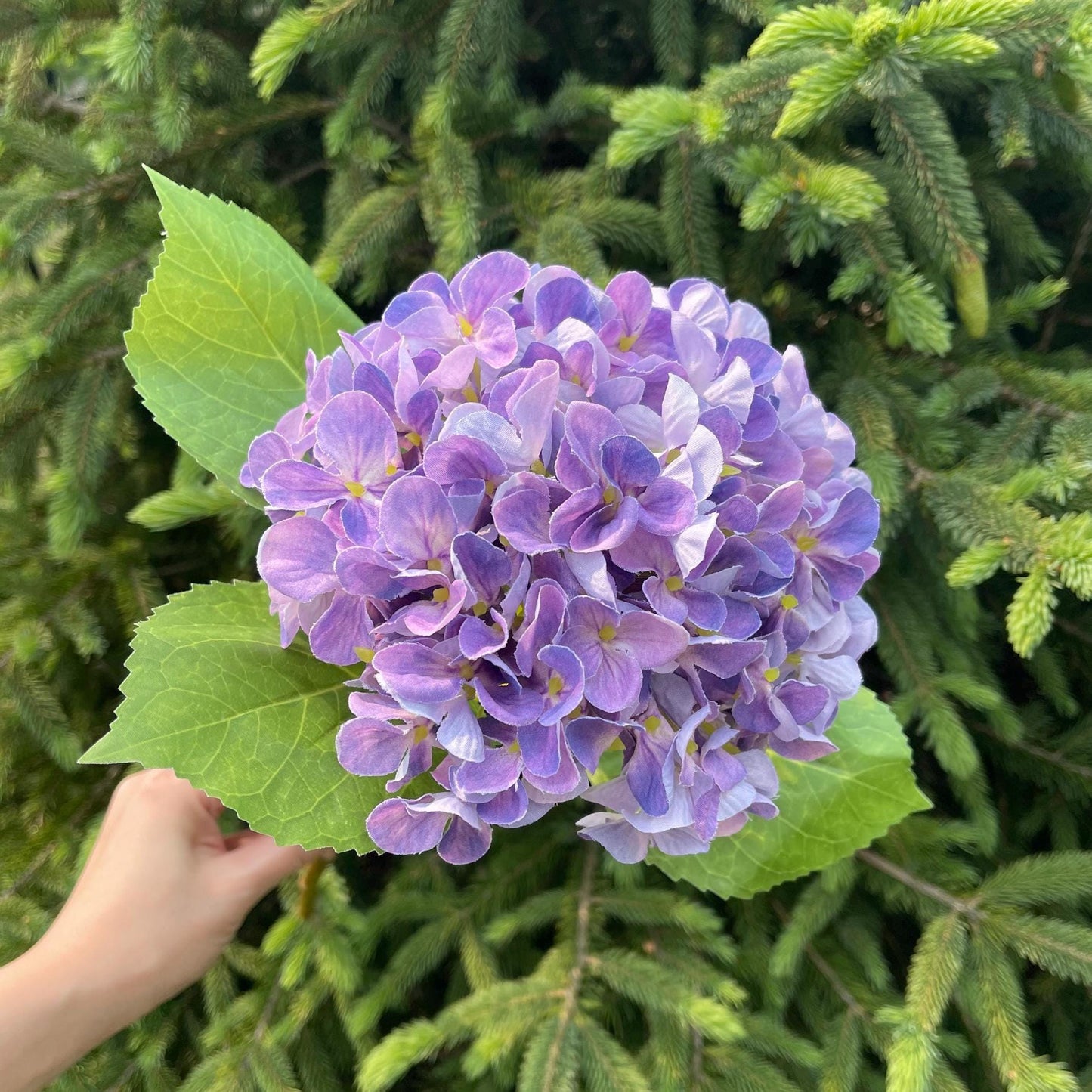 Purple faux hydrangea flower head detail