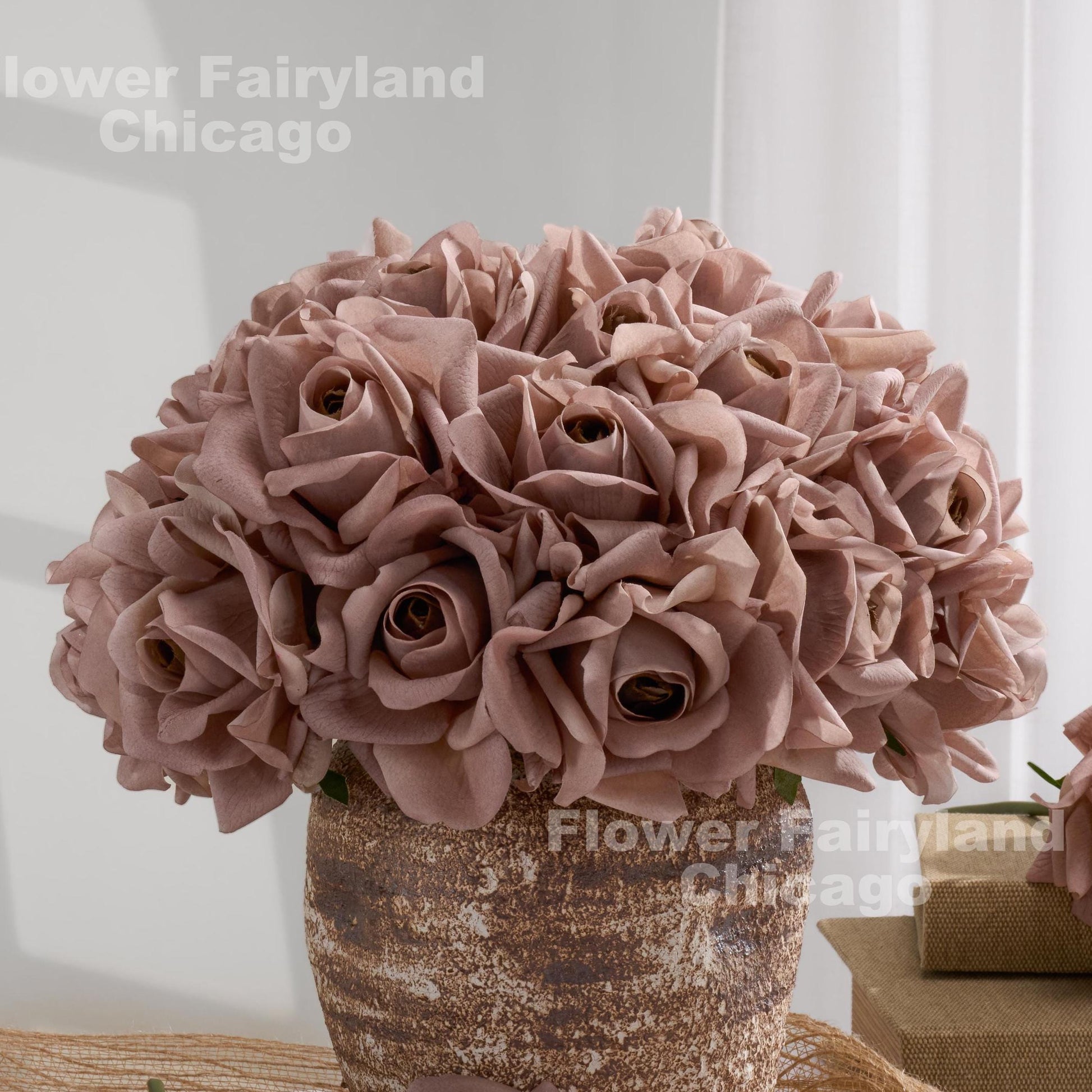 Light mocha roses styled in vase