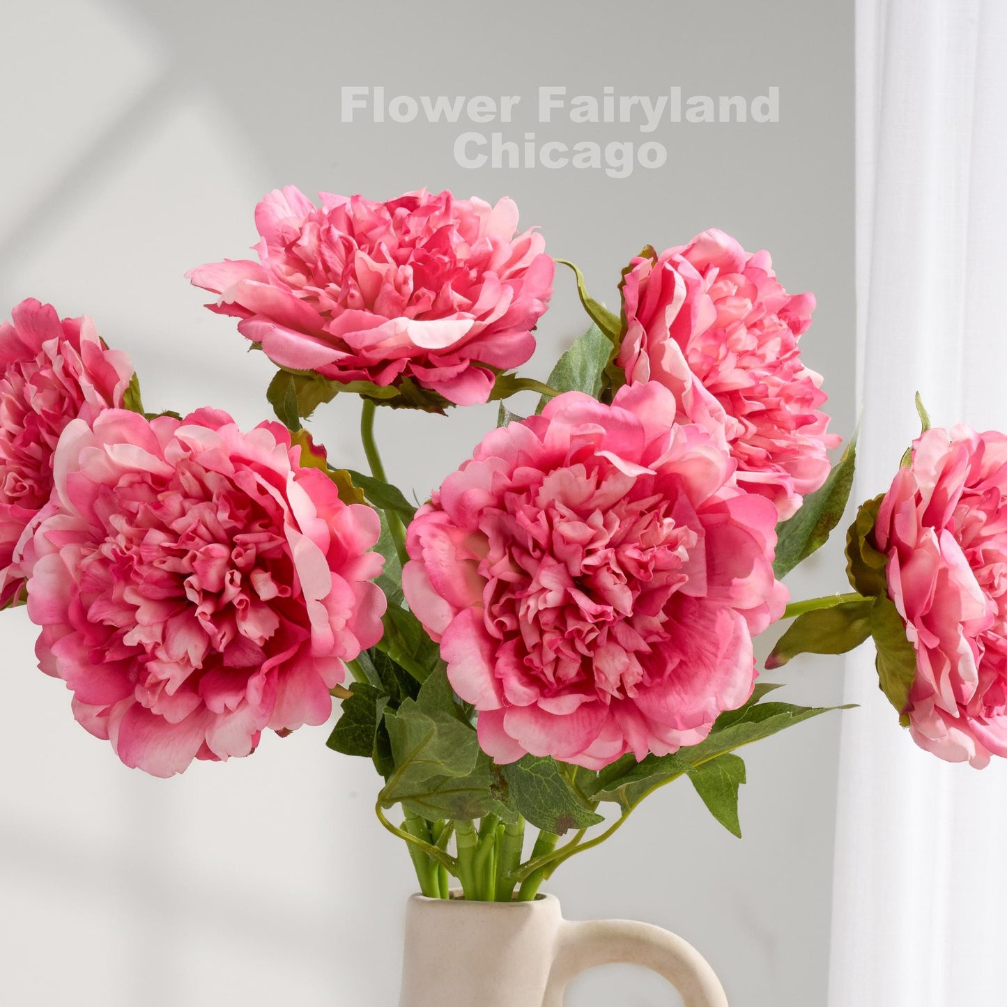 Raspberry splash faux peony blooms close up