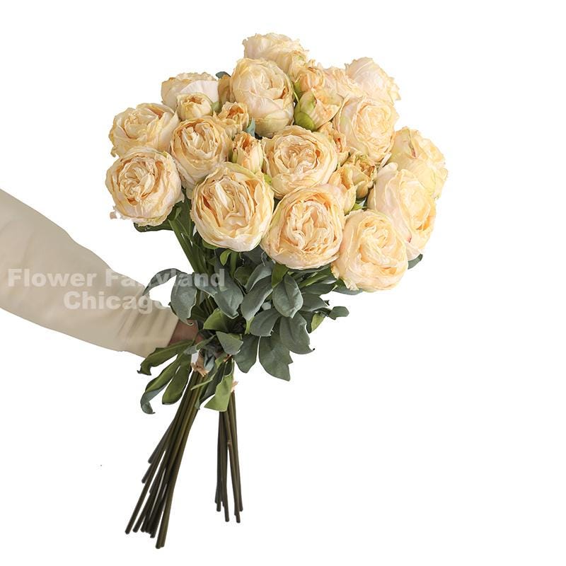 Yellow dried look peony and rose bouquet detail