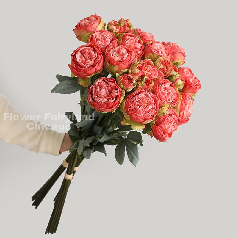 Coral red dried look peony and rose bouquet detail