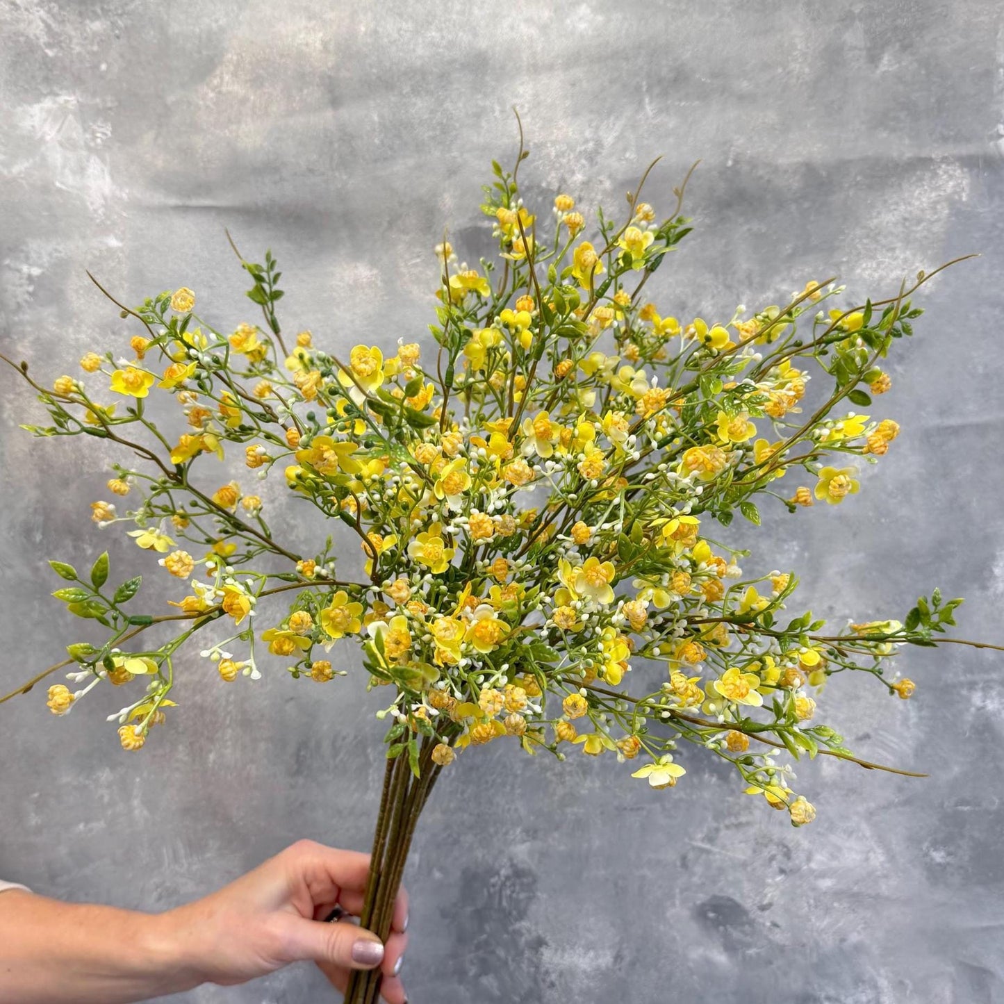 Yellow faux wax flower branches
