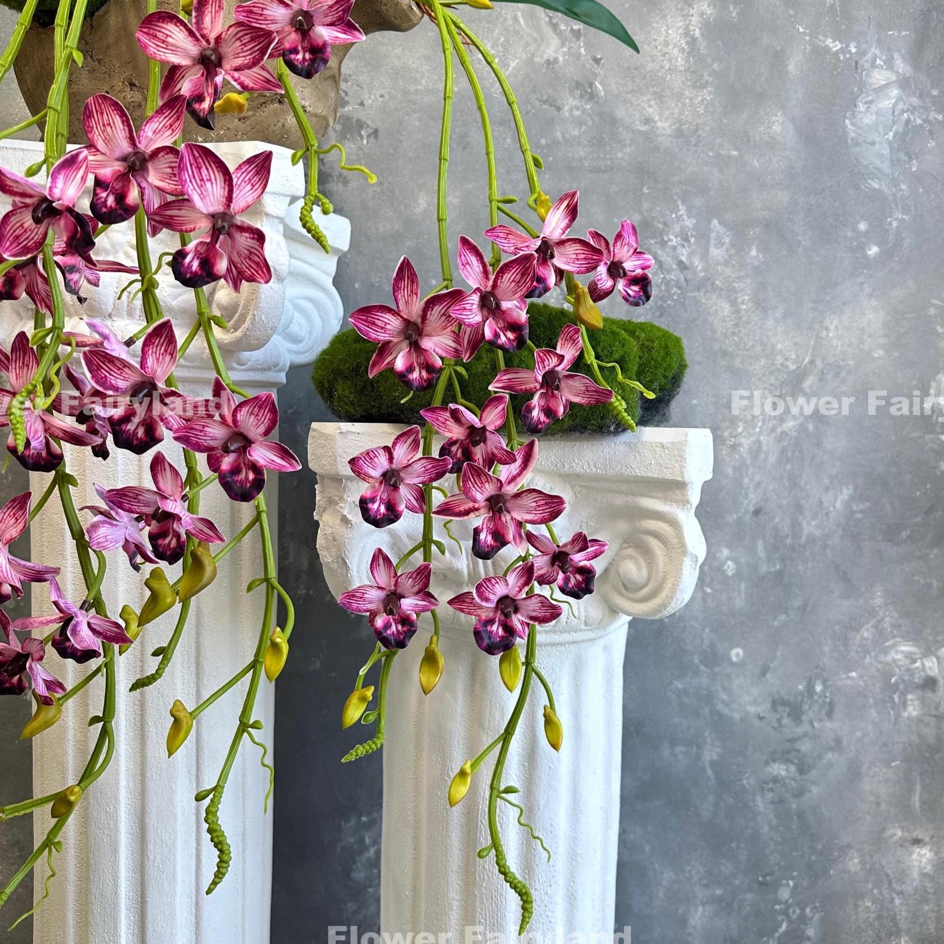 Bright pink faux hanging Rodriguezia orchid