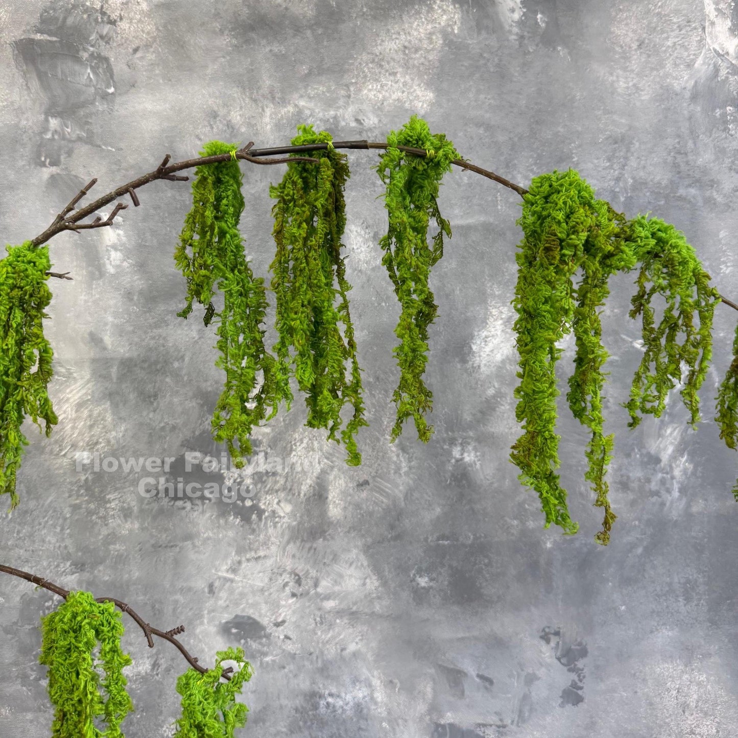 Faux weeping moss branch draping detail