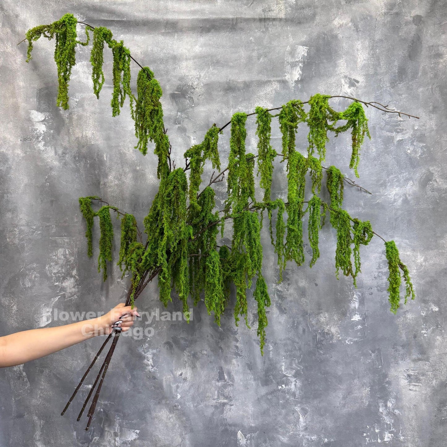 Faux weeping moss branch arrangement