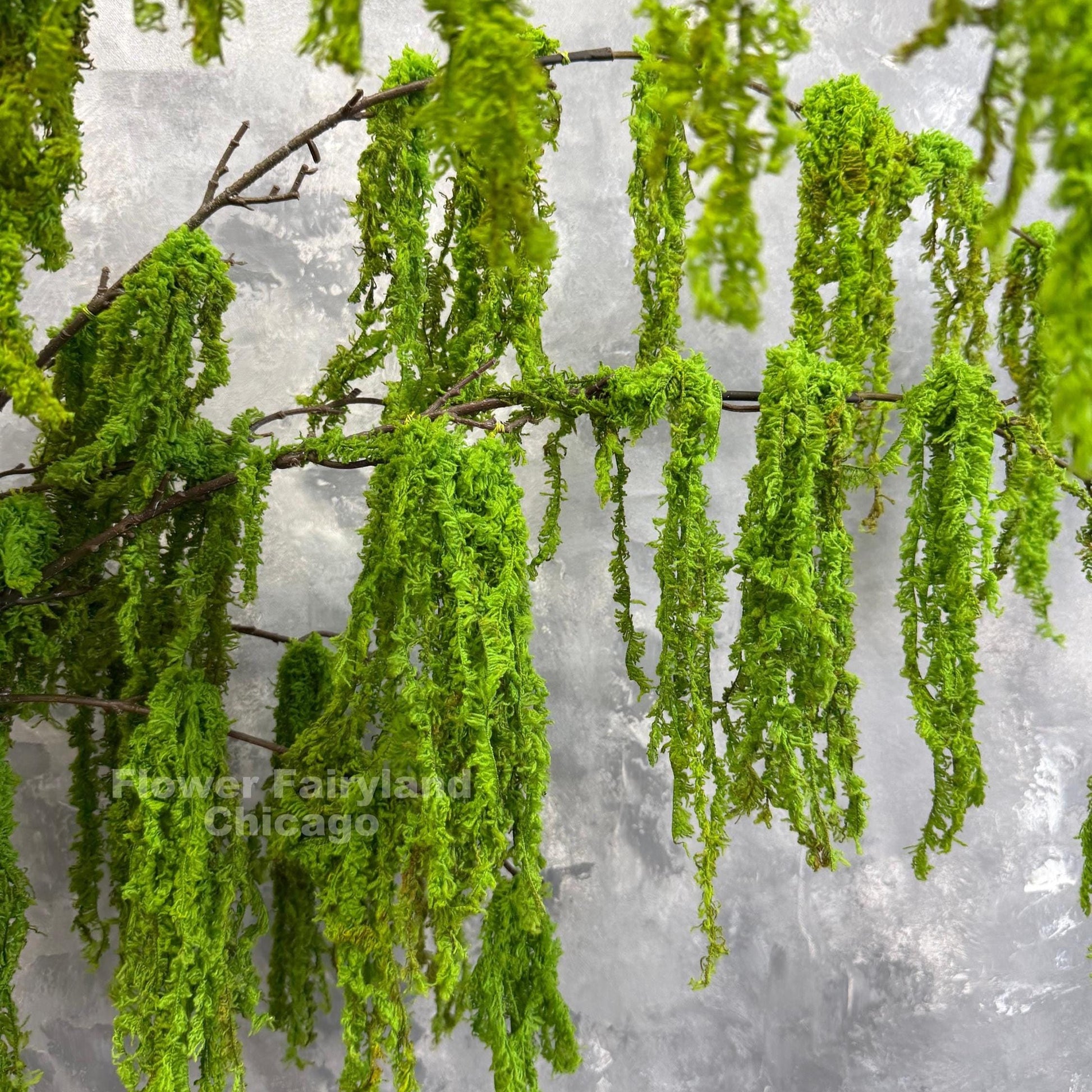Faux weeping moss branch decor idea