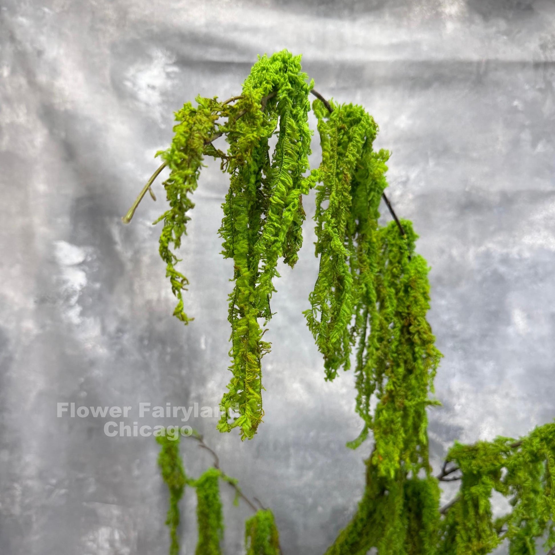 Faux weeping moss branch detail